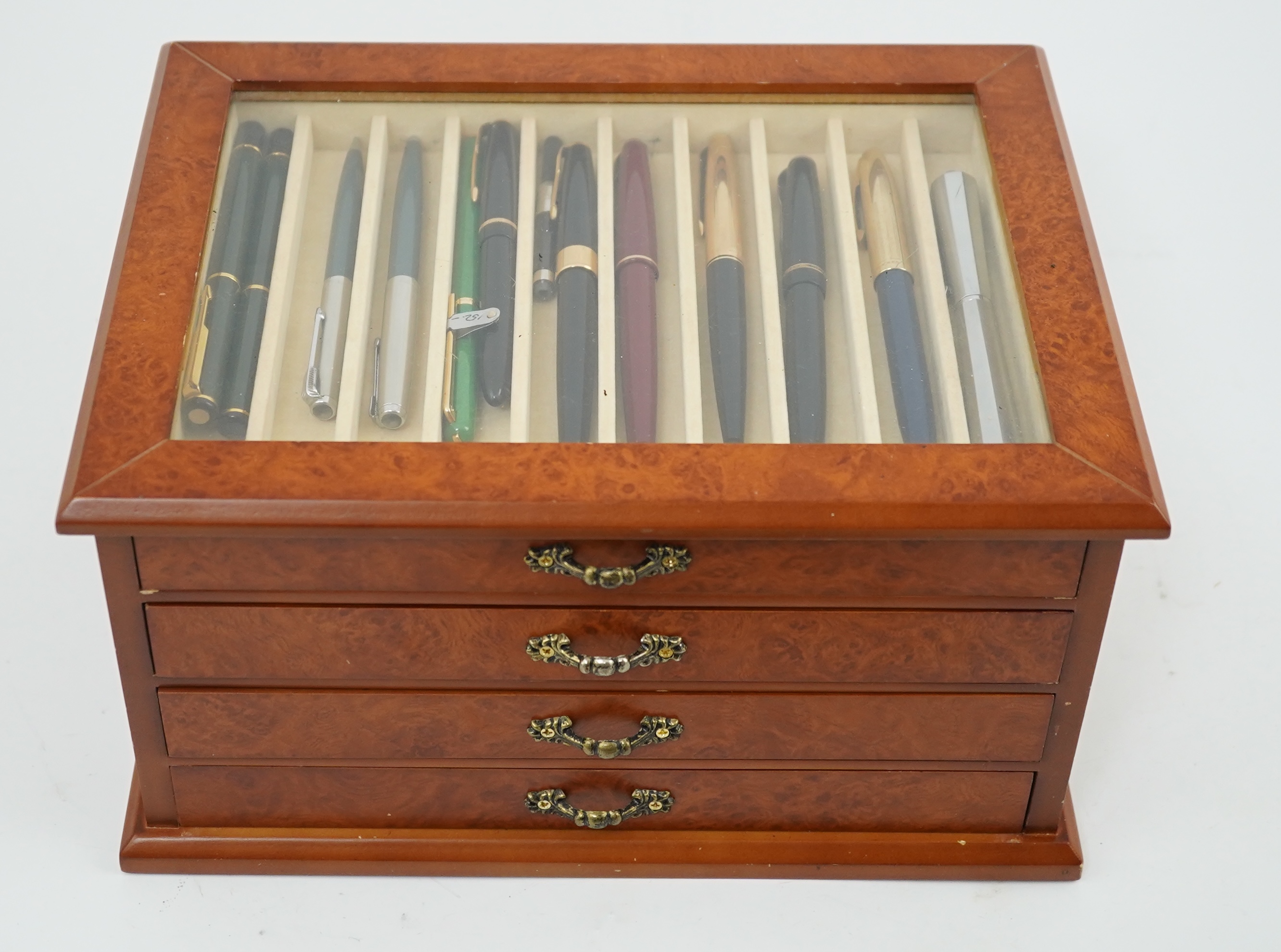 A large quantity of pens etc. and collector's cabinet